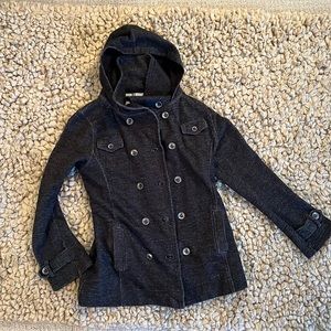 Woman’s Ezekiel fitted button down hoodie.